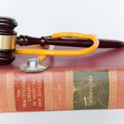 Gavel on top of medical law book