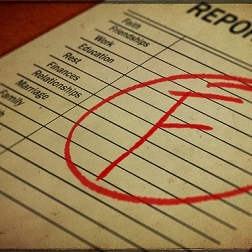 report card with "F"