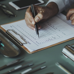 Hospital worker goes through medical checklist