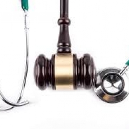 close-up of gavel and stethoscope